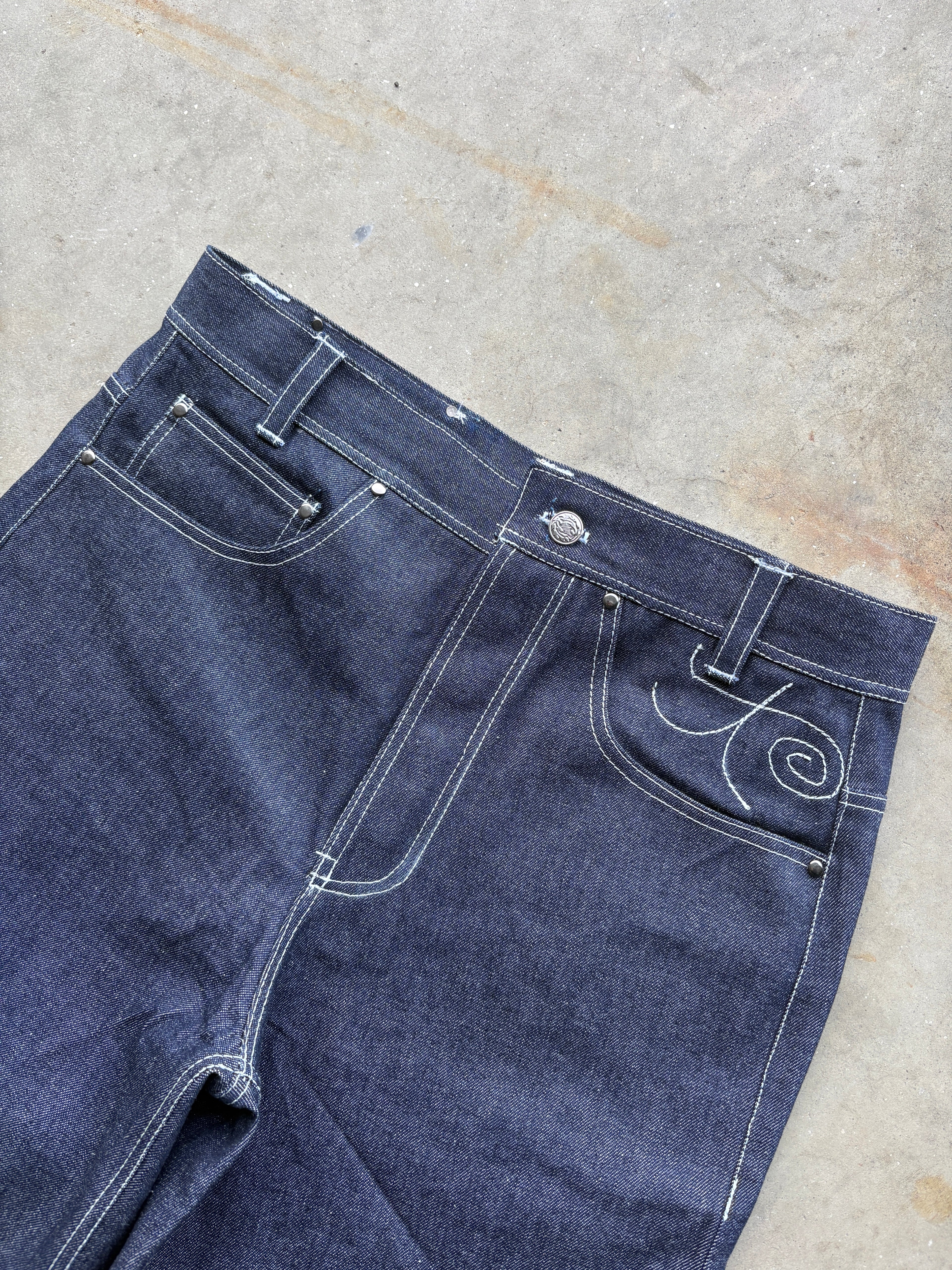 CHAIN LINK RAW DENIM JEANS