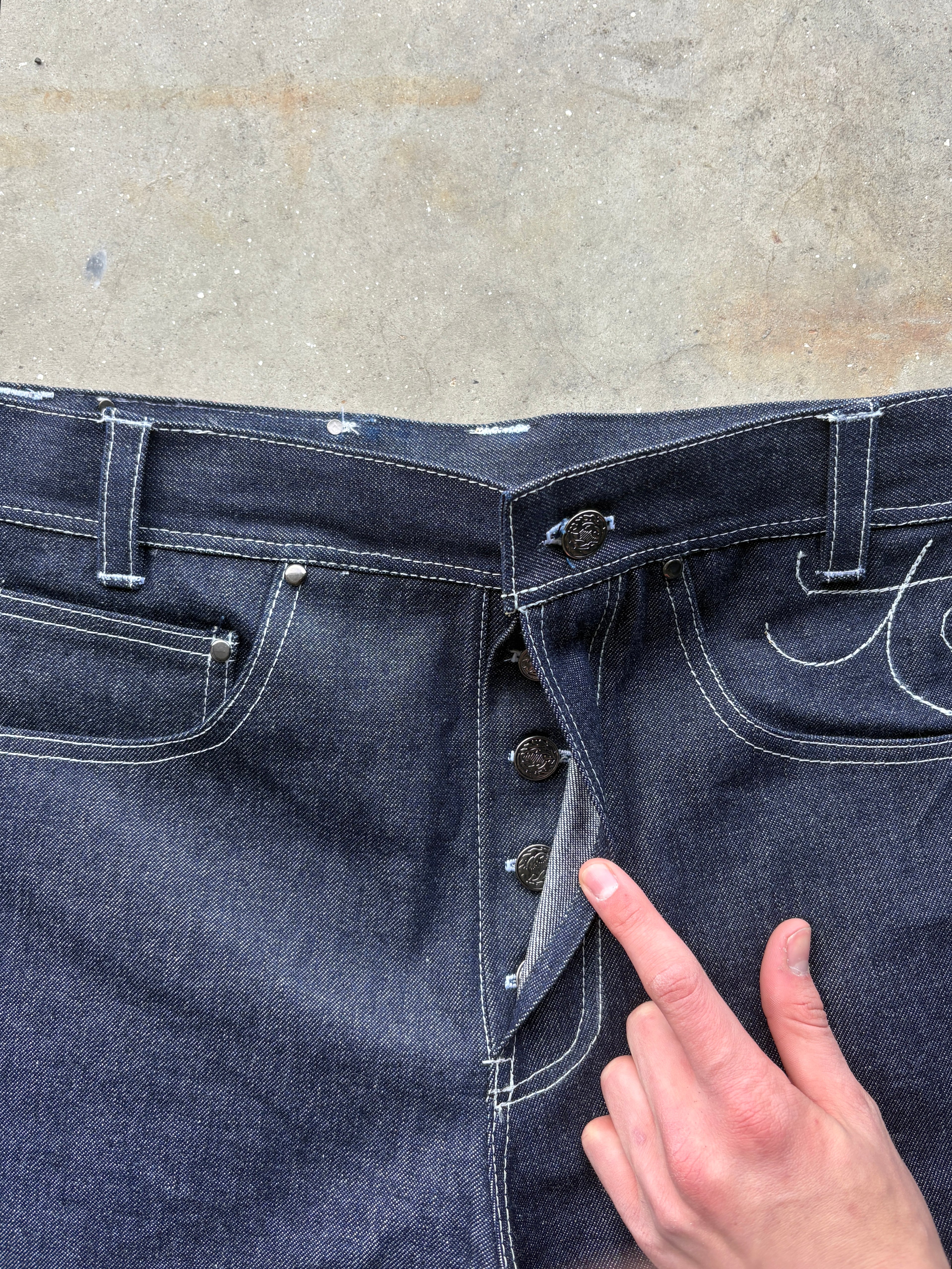 CHAIN LINK RAW DENIM JEANS