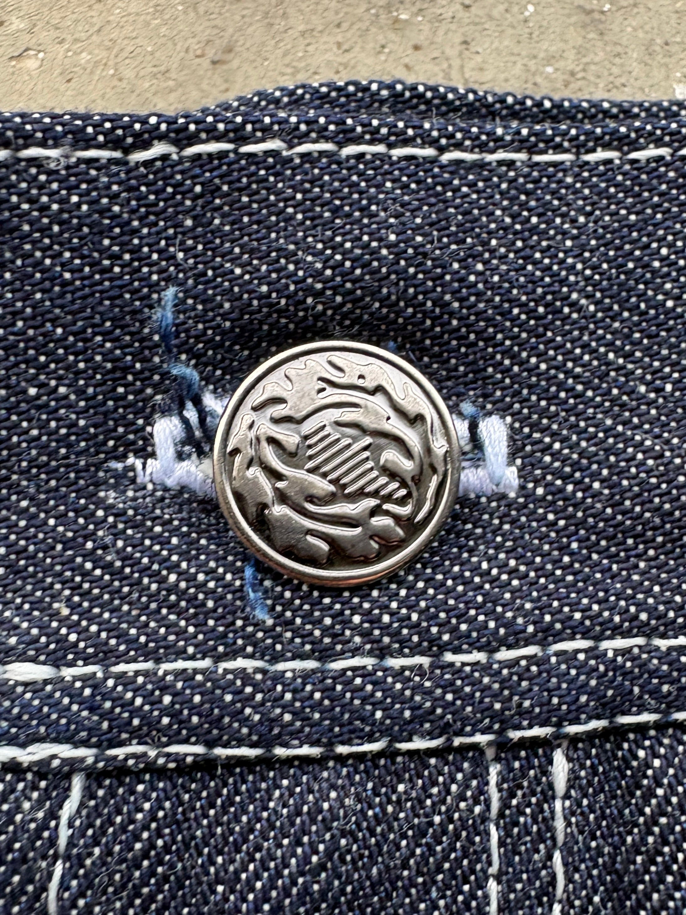 CHAIN LINK RAW DENIM JEANS