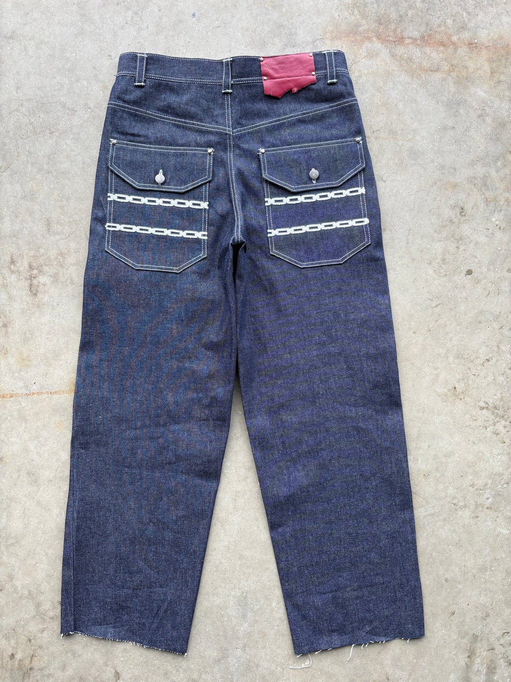 CHAIN LINK RAW DENIM JEANS