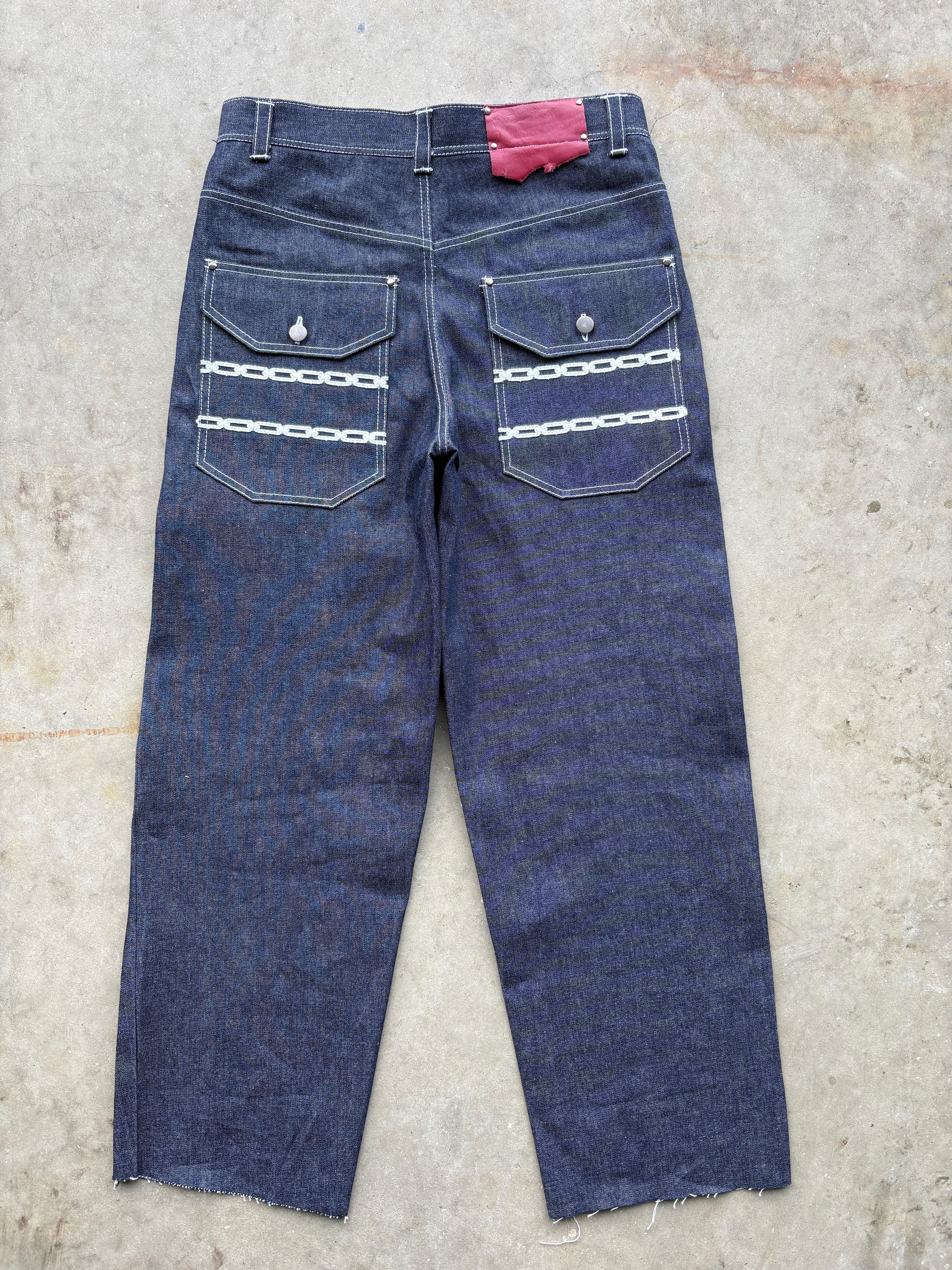 CHAIN LINK RAW DENIM JEANS