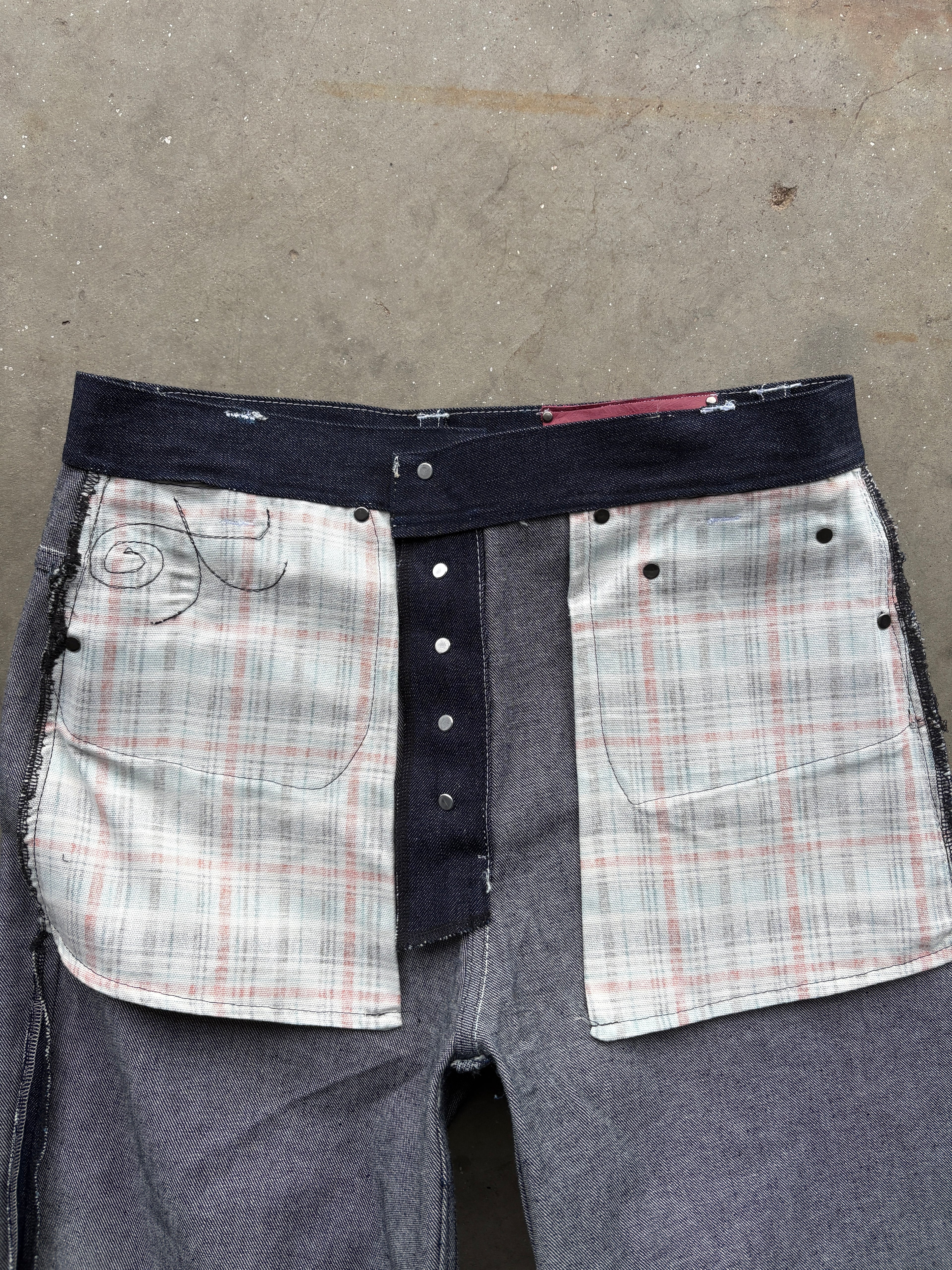 CHAIN LINK RAW DENIM JEANS